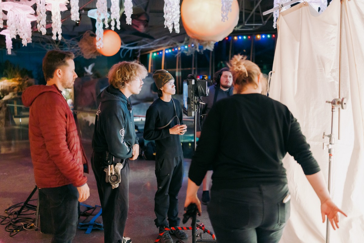Evan Monheit on set with the crew at the monitor